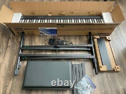 Casio Electronic Piano CDP-S100 with music stand, bench, and X-stand