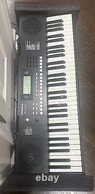 Roland E-X10 Arranger Keyboard Electronic Piano with Music Rest and Power Adapter