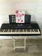 Yamaha Psr-190 61-key Piano Keyboard With Music Rest, Power Cord & Book