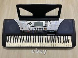 Yamaha PSR-340 Portatone Electronic Keyboard with Music Stand and Adapter