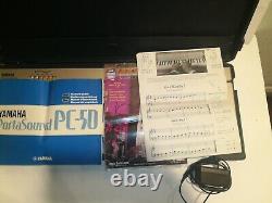Clavier YAMAHA PortaSound PC-100 avec étui de leçons de musique et adaptateur secteur