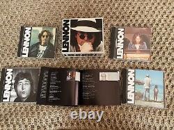 Lennon 4cd 1 Booklet Box Set translates to 'Lennon Coffret 4cd 1 livret'.
