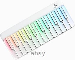 Piano portable intelligent PopuPiano avec lumière LED, clavier de musique à code et 29 touches.